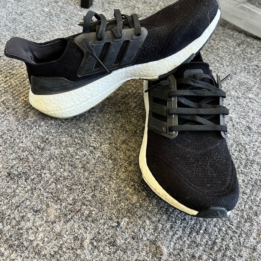Adidas Ultraboost black on black with white soles athletic shoes size 9.